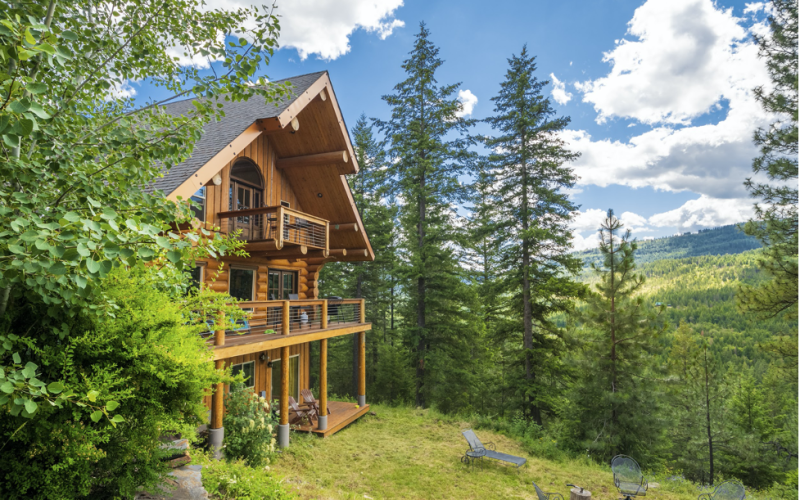 Take in stunning vistas of lakes and valleys from your hillside Okanagan property